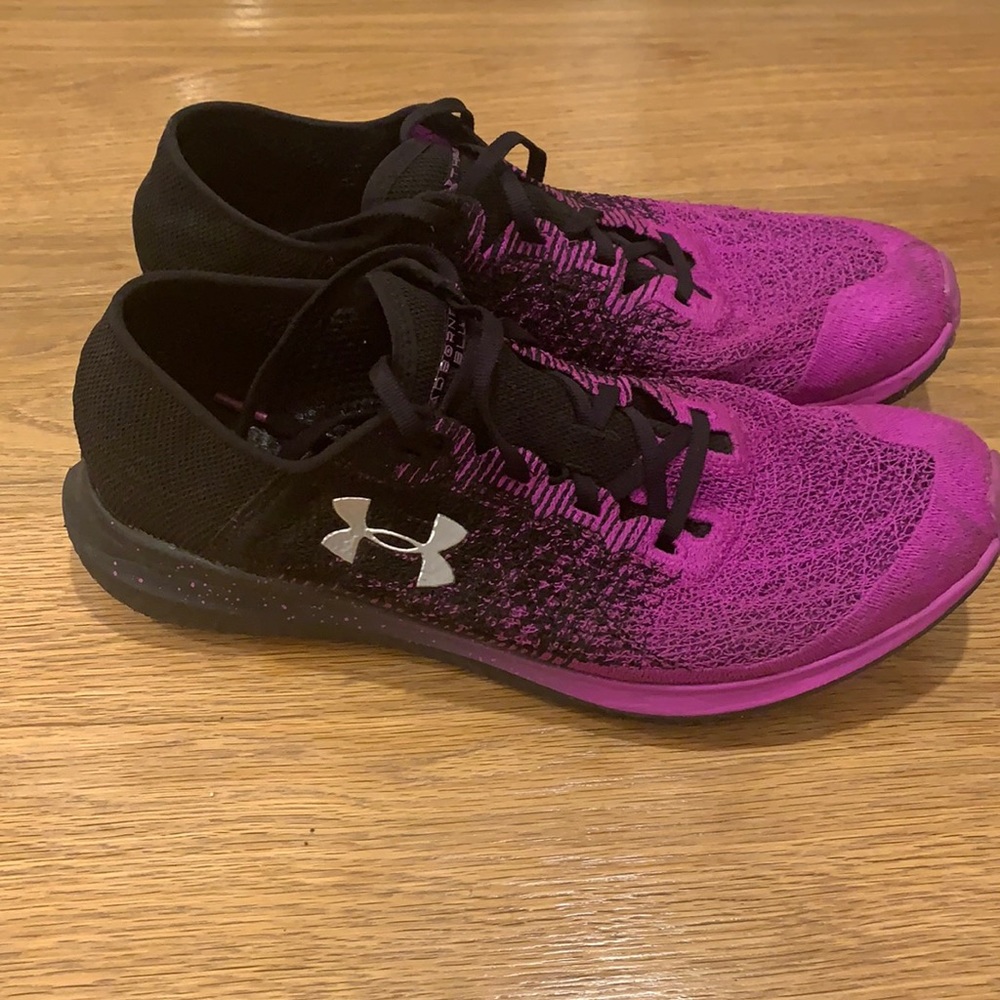 Under Armour Men’s 11.5 running shoes. Fair to good condition. Black and Purple